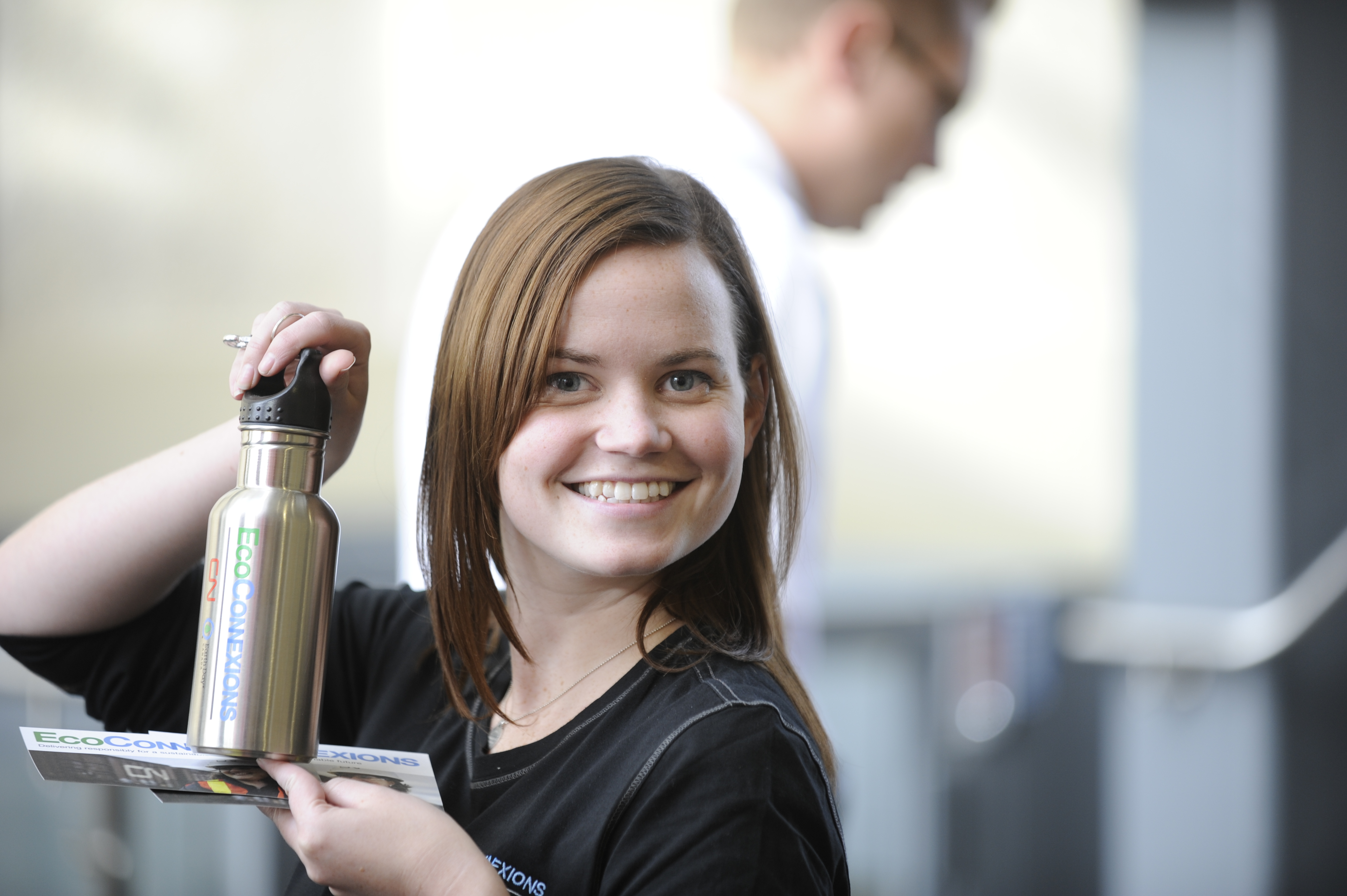EcoChampions engage employees with free stainless steel water bottles, stamped with tips for each of the program pillars.